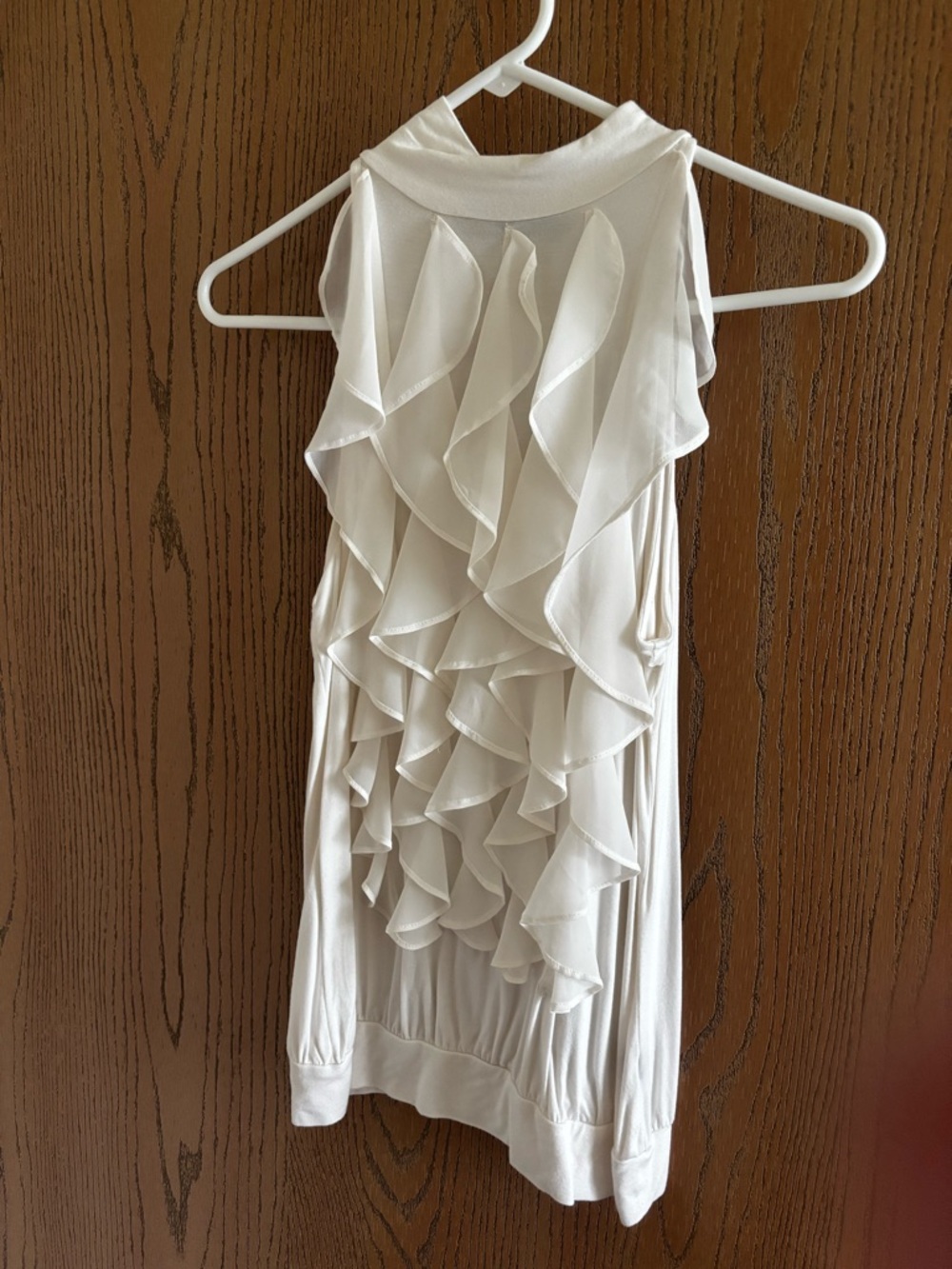 The Limited White Sleeveless Top with Subtle Ruffle